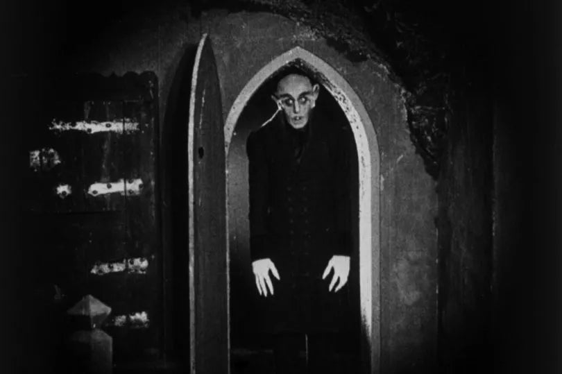 Count Orlok standing in a doorway, still from the 1922 film
